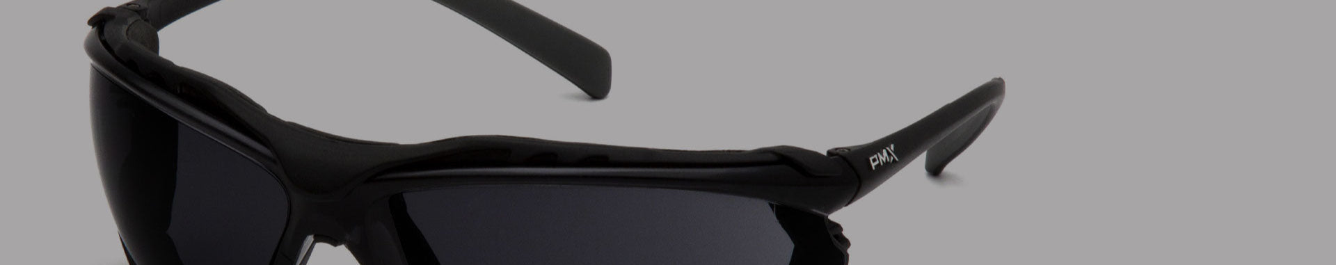 Black sunglasses with a gray background